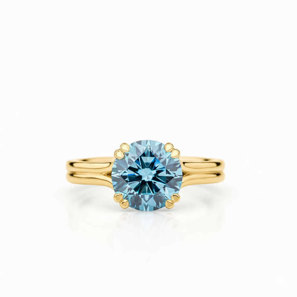 Gold ring with a blue gemstone on a white background