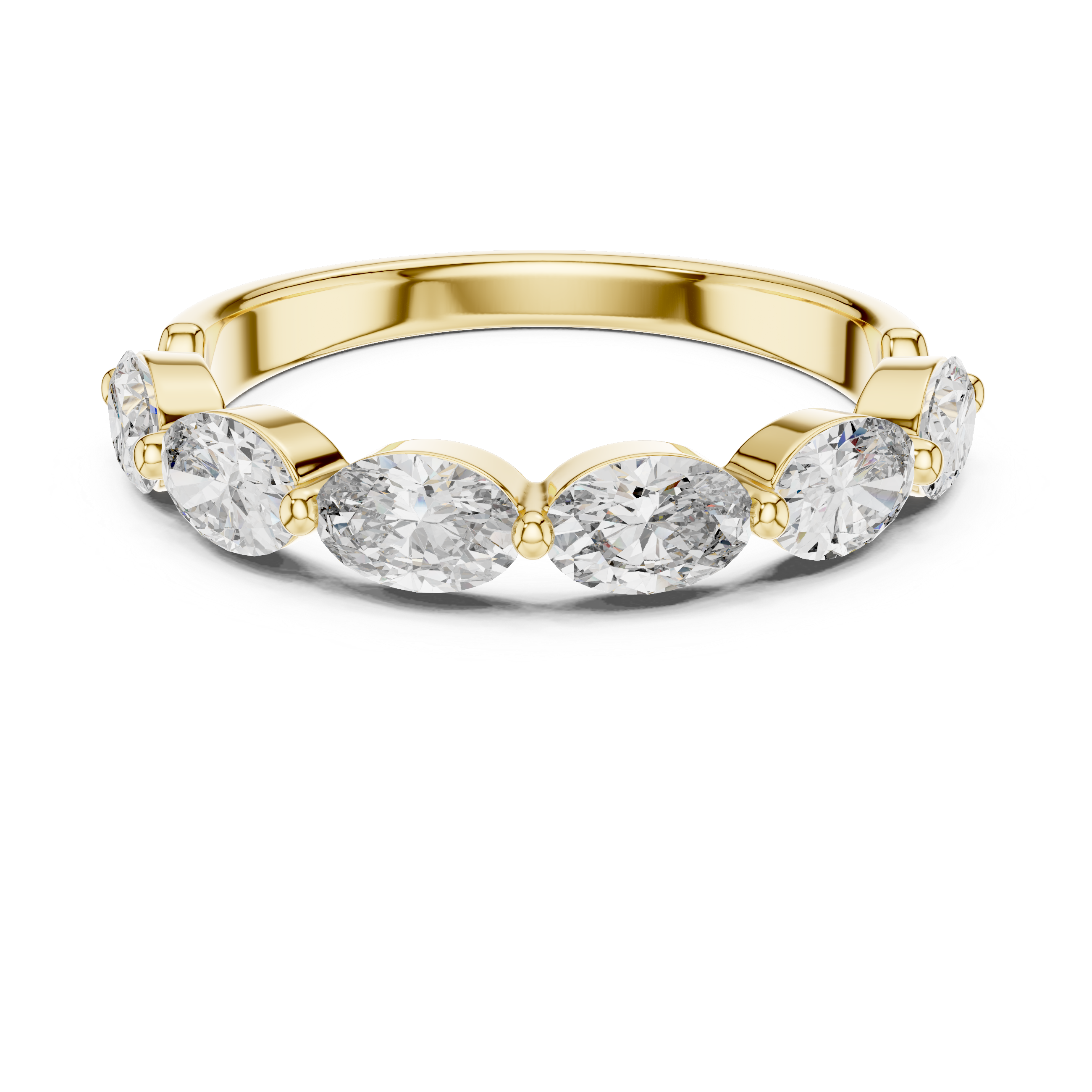 Gold ring with four clear gemstones on a white background