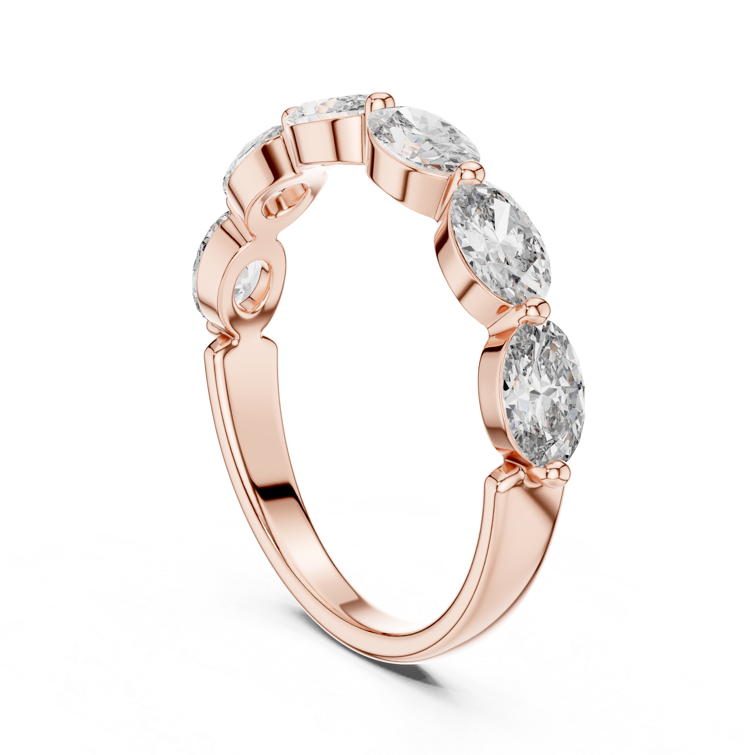 Rose gold ring with three clear gemstones on a white background