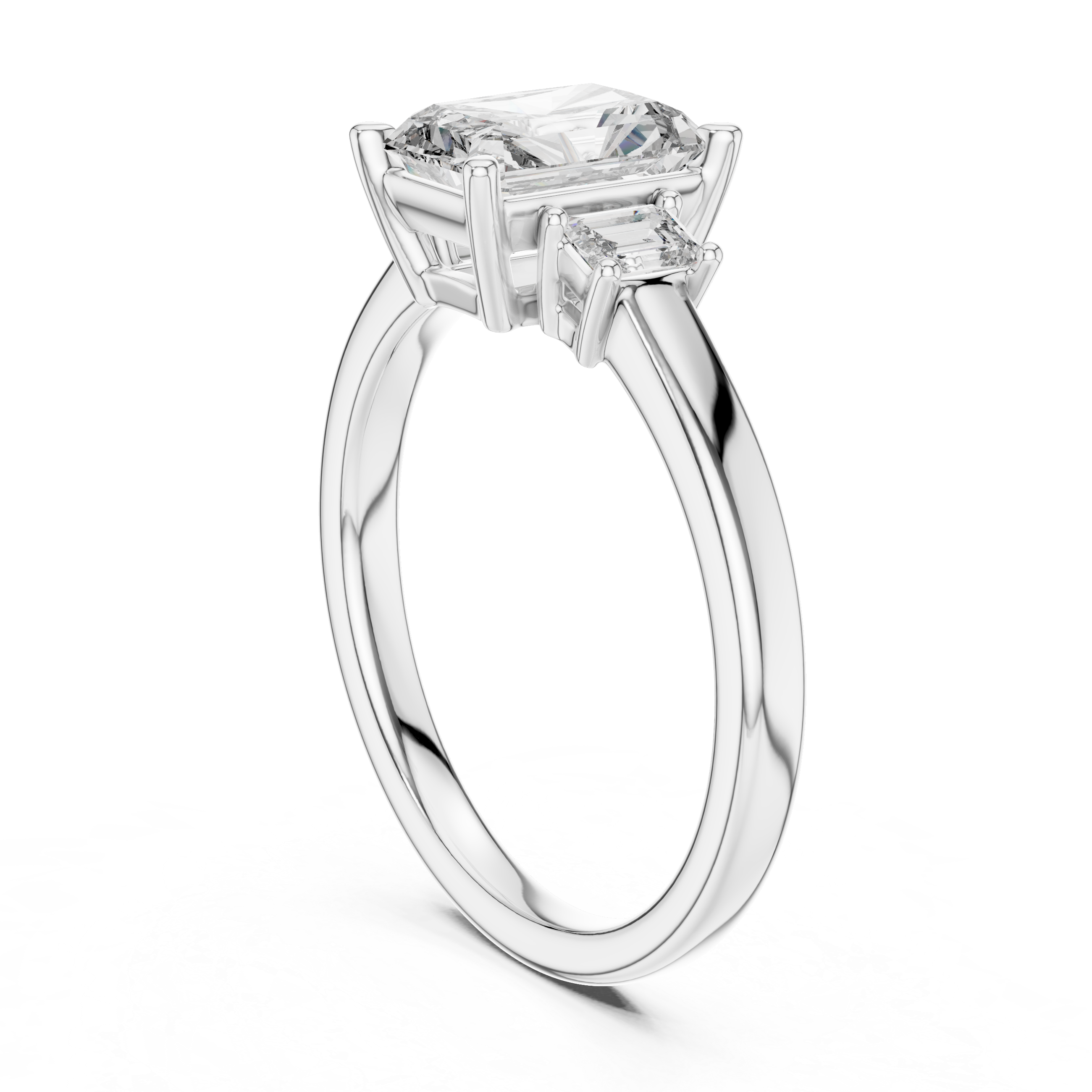 Diamond ring with a rectangular stone on a white background