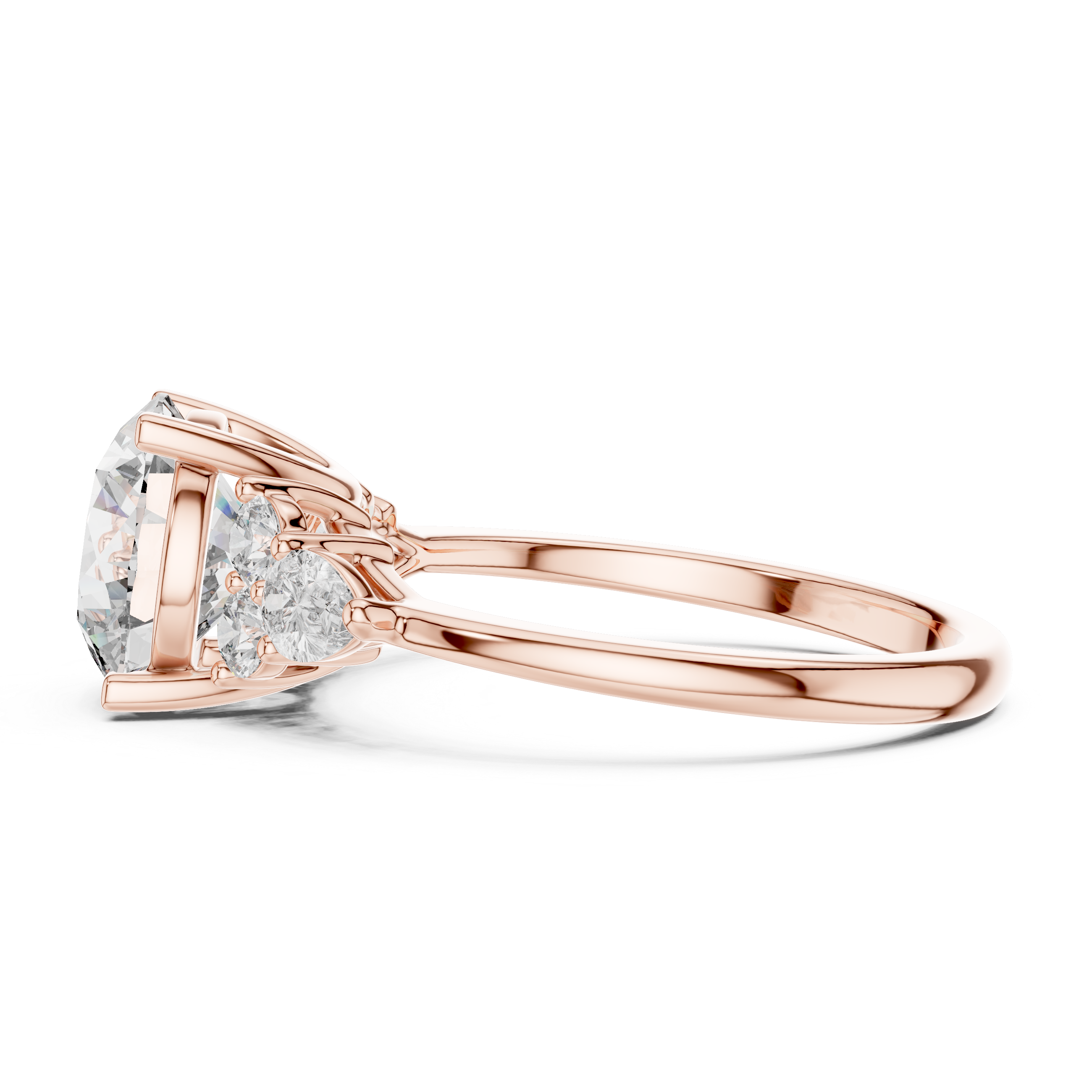 Rose gold ring with a pear-shaped diamond on a white background