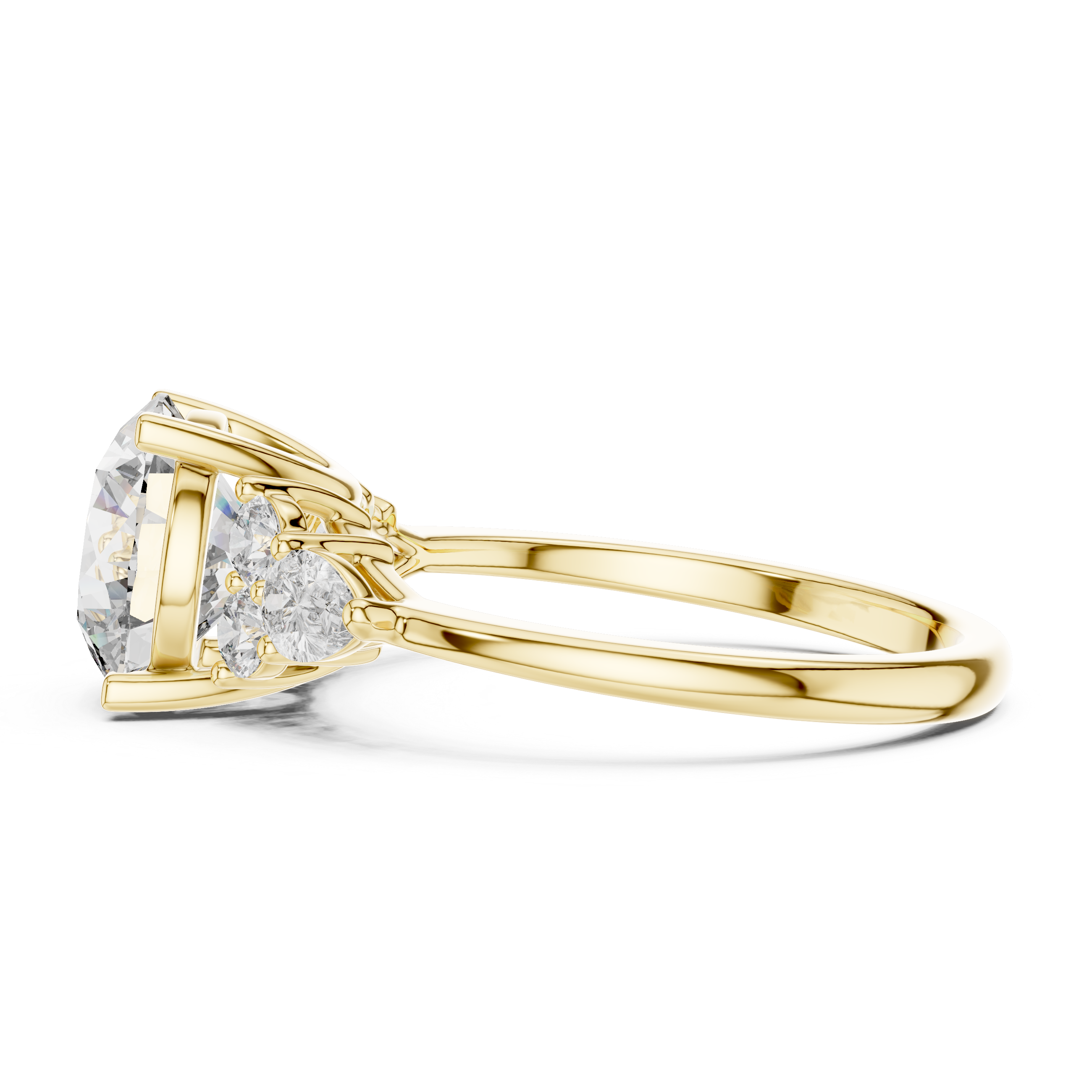Gold ring with a pear-shaped diamond on a white background