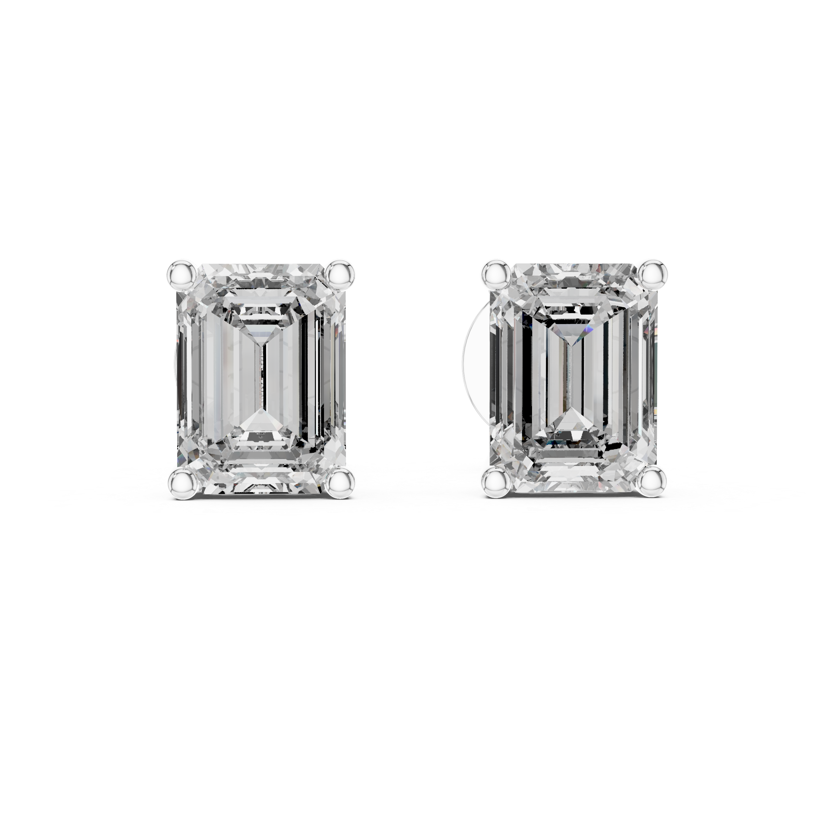 Pair of emerald-cut diamond earrings on a white background