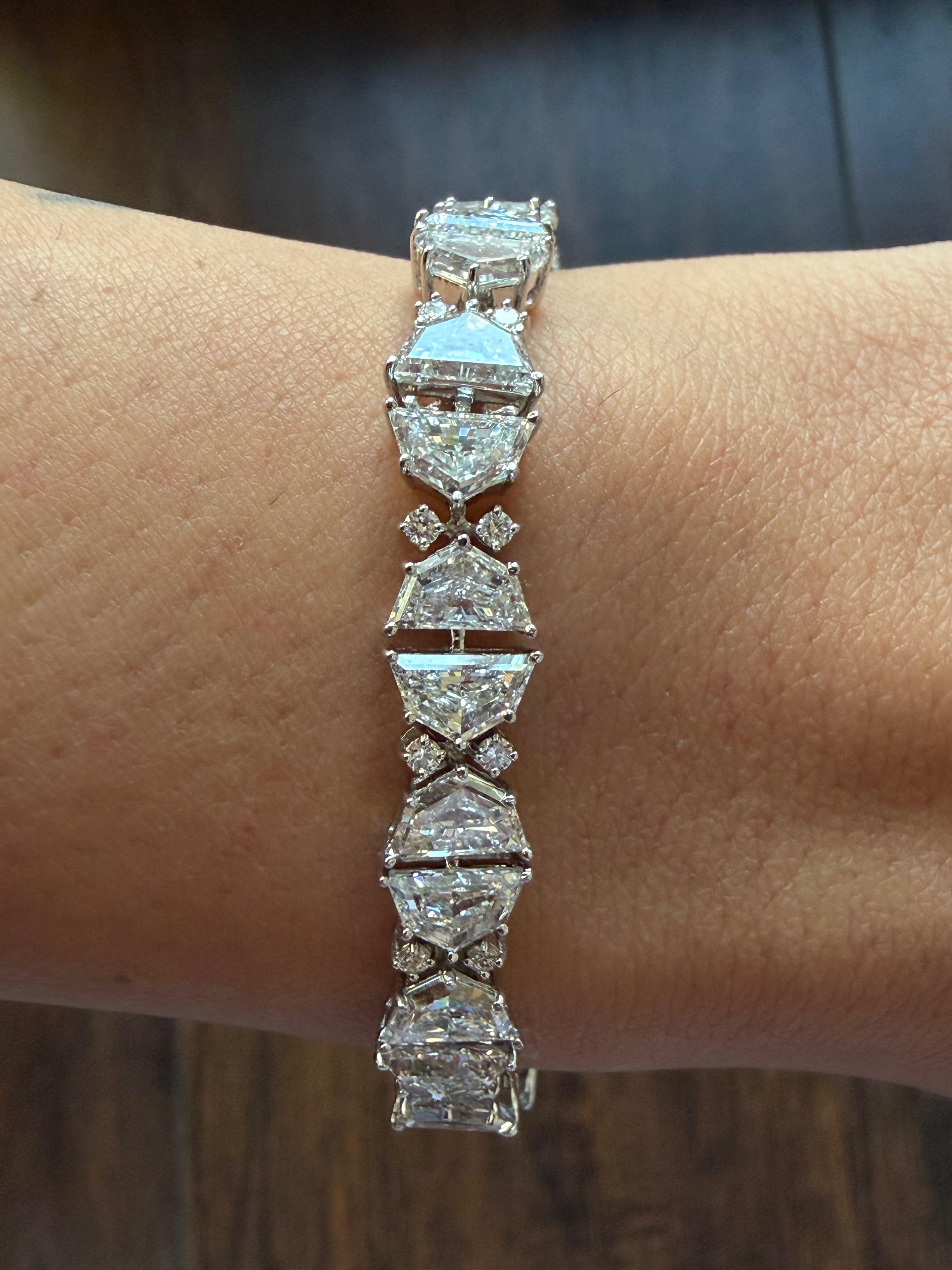 Diamond bracelet on a wrist with a blurred background