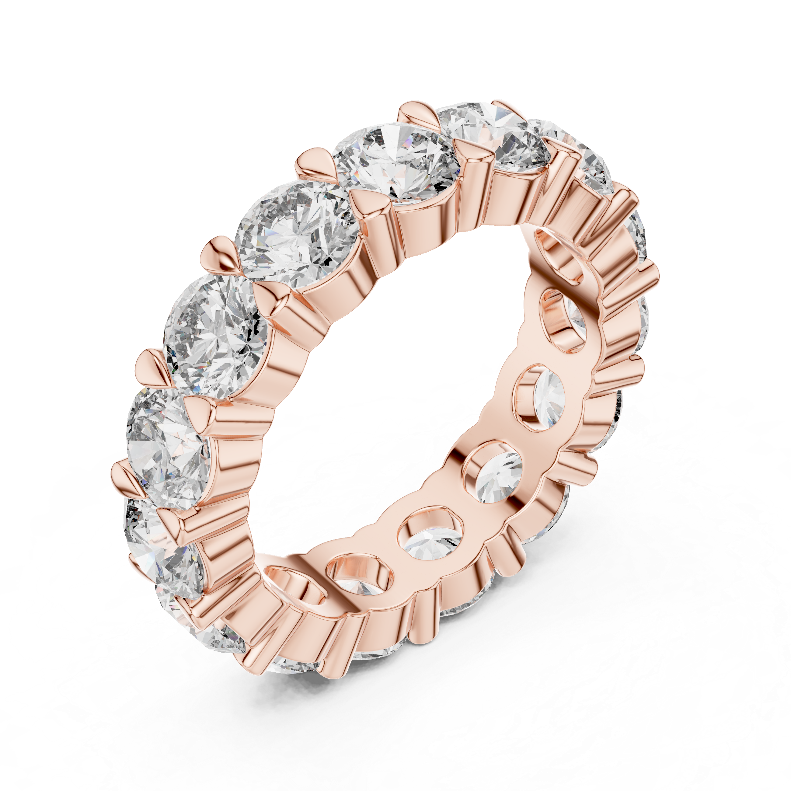 Rose gold ring with clear gemstones on a white background