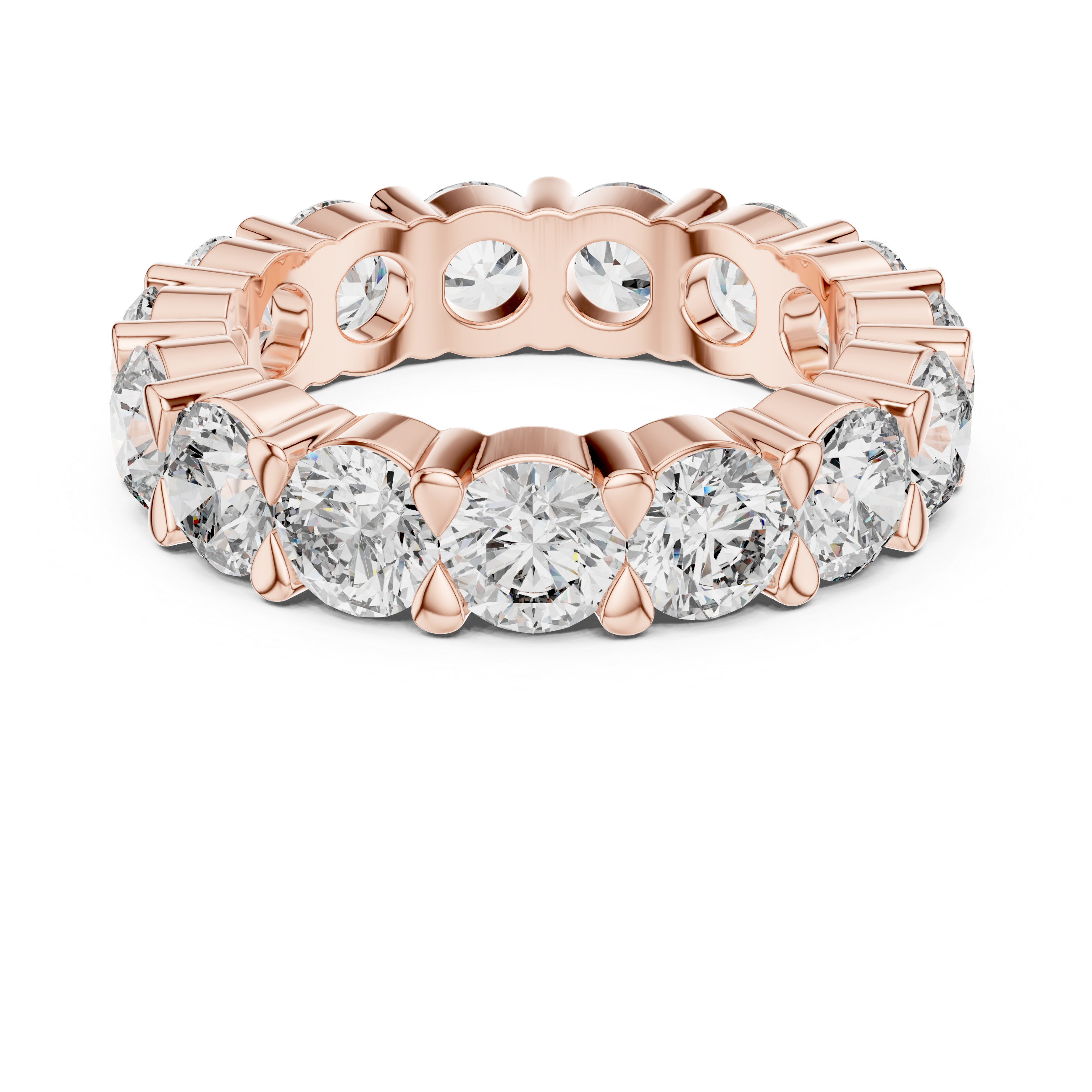Rose gold ring with clear gemstones on a white background