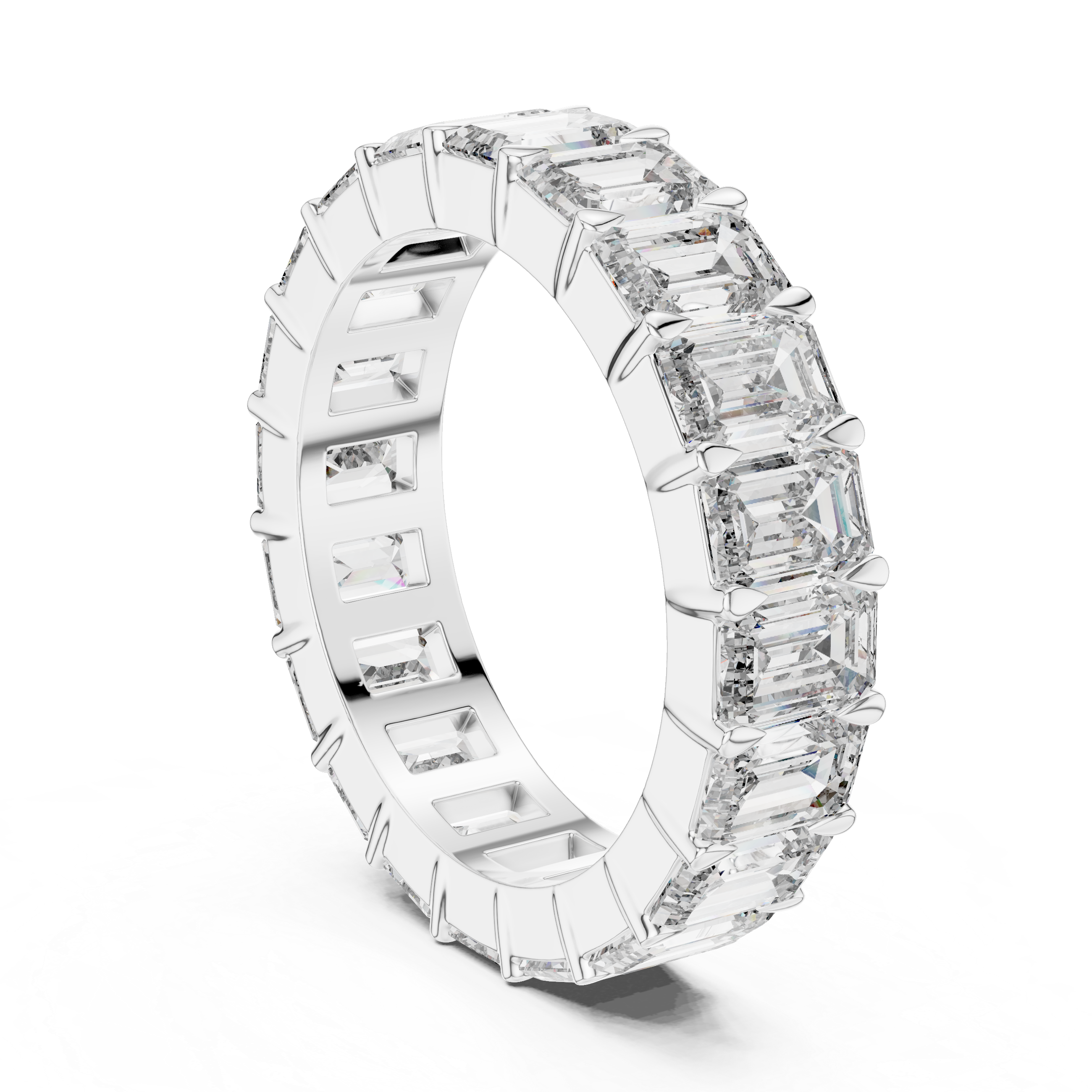 Elegant diamond ring with emerald-cut stones on a white background