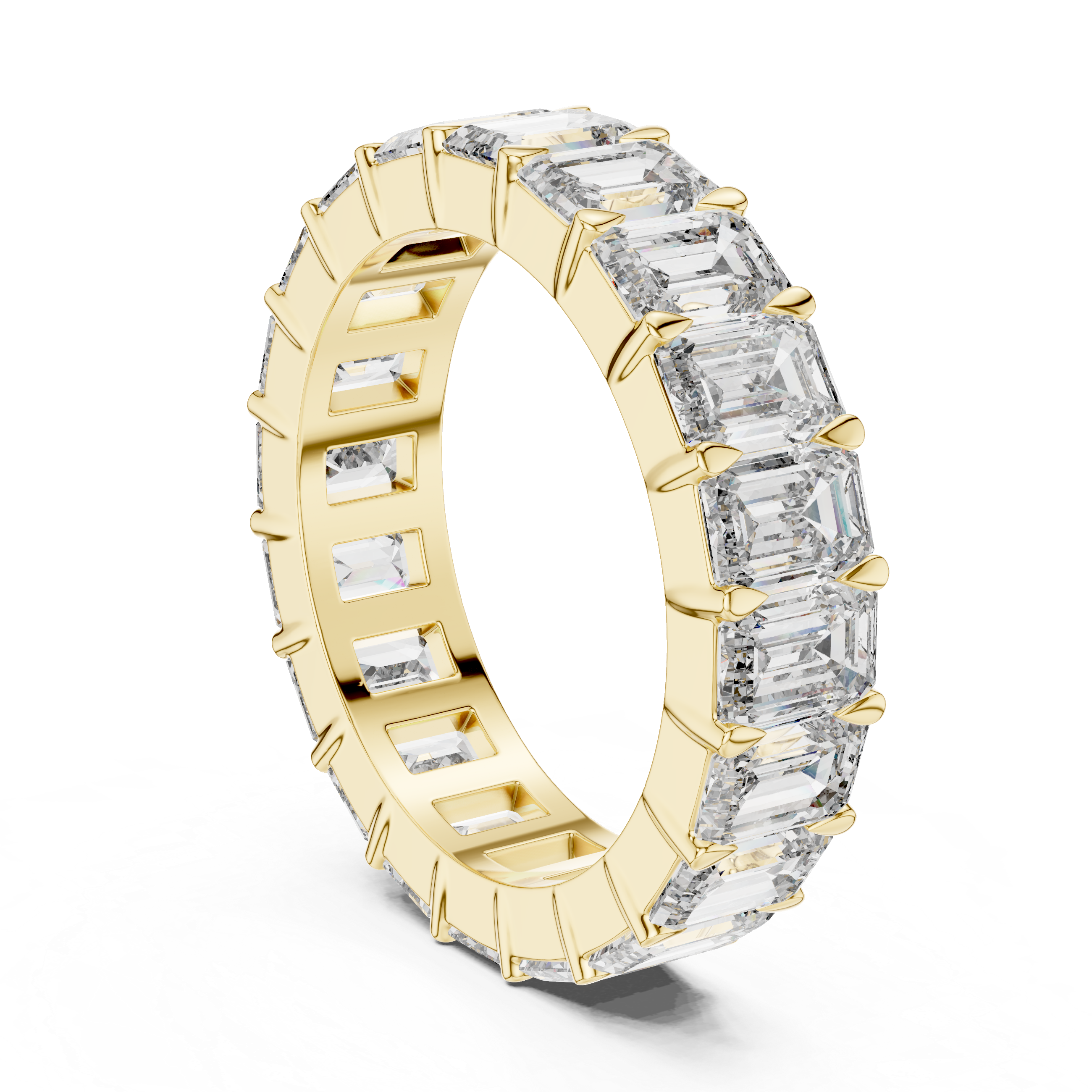 Gold ring with emerald-cut diamonds on a white background