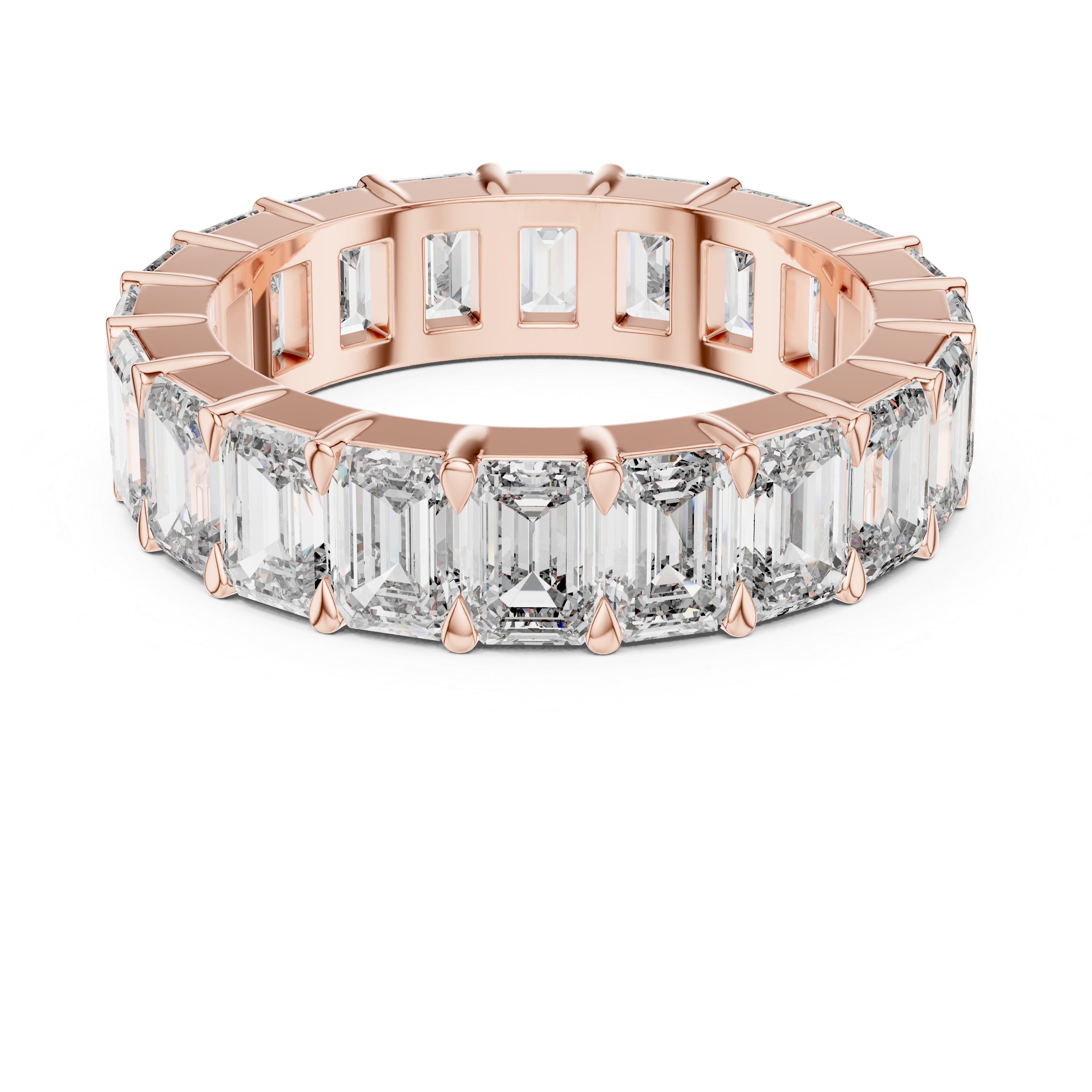 Rose gold ring with emerald-cut diamonds on a white background