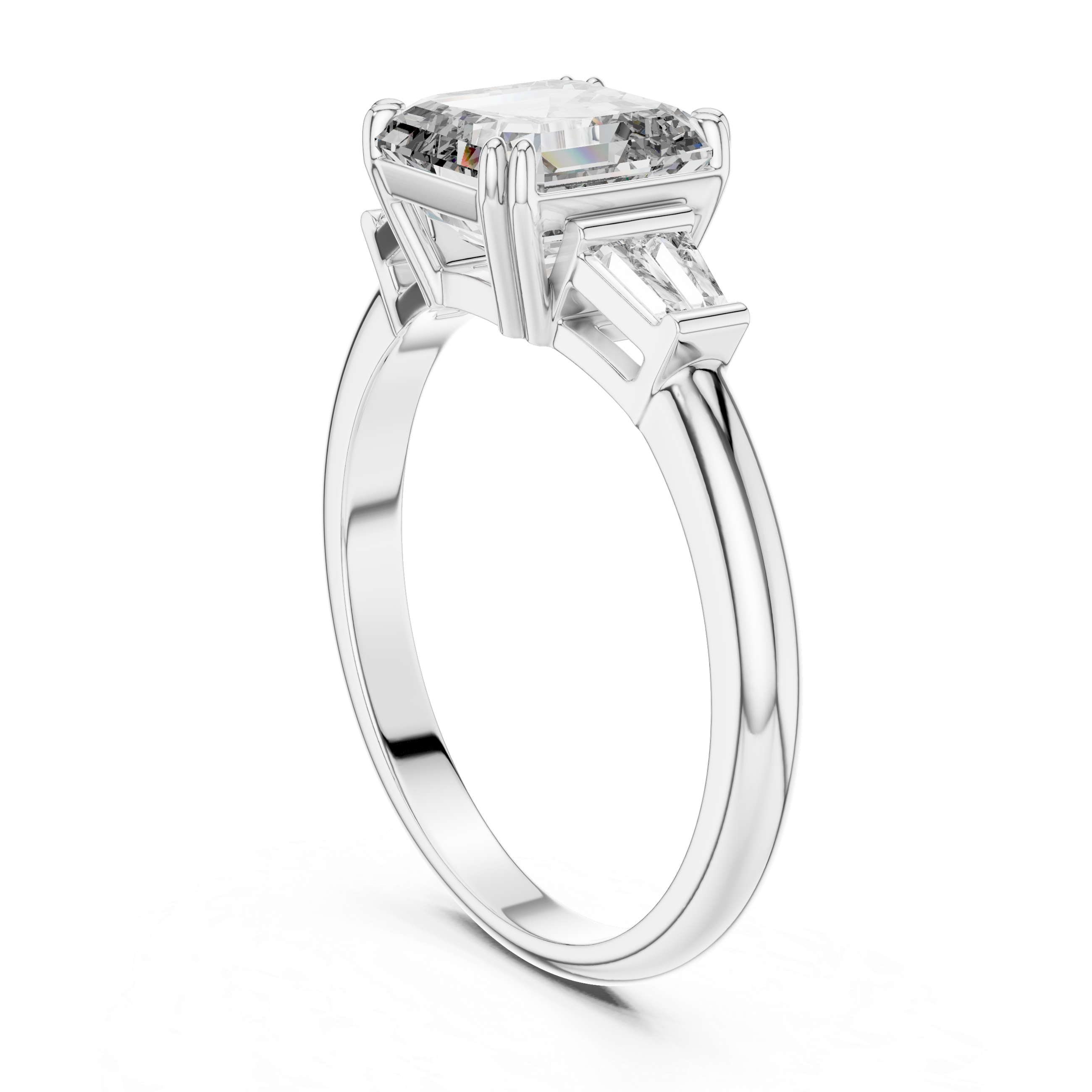 Diamond ring with a rectangular center stone on a white background