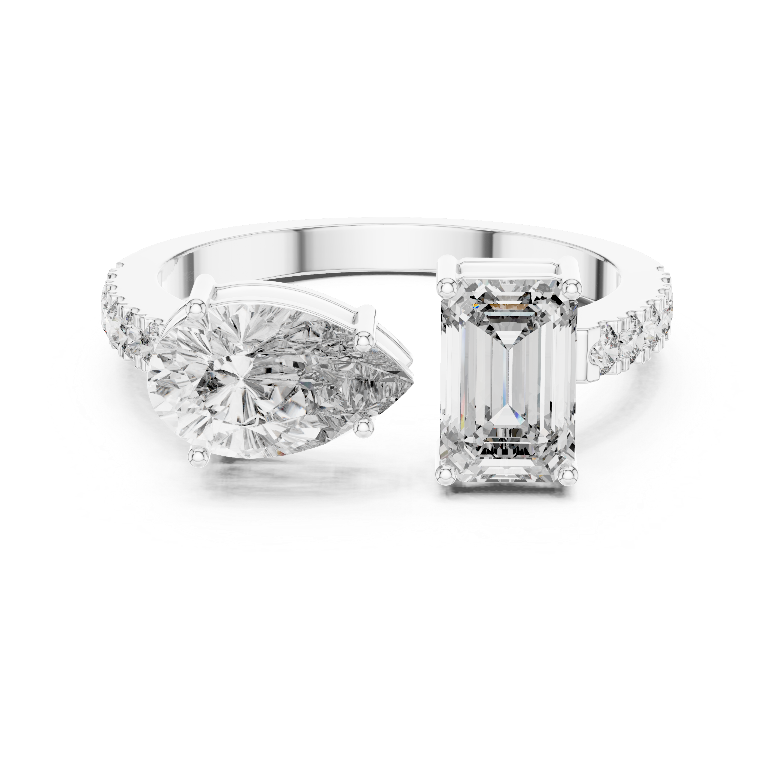 Diamond ring with pear-shaped and emerald-cut diamonds on a white background