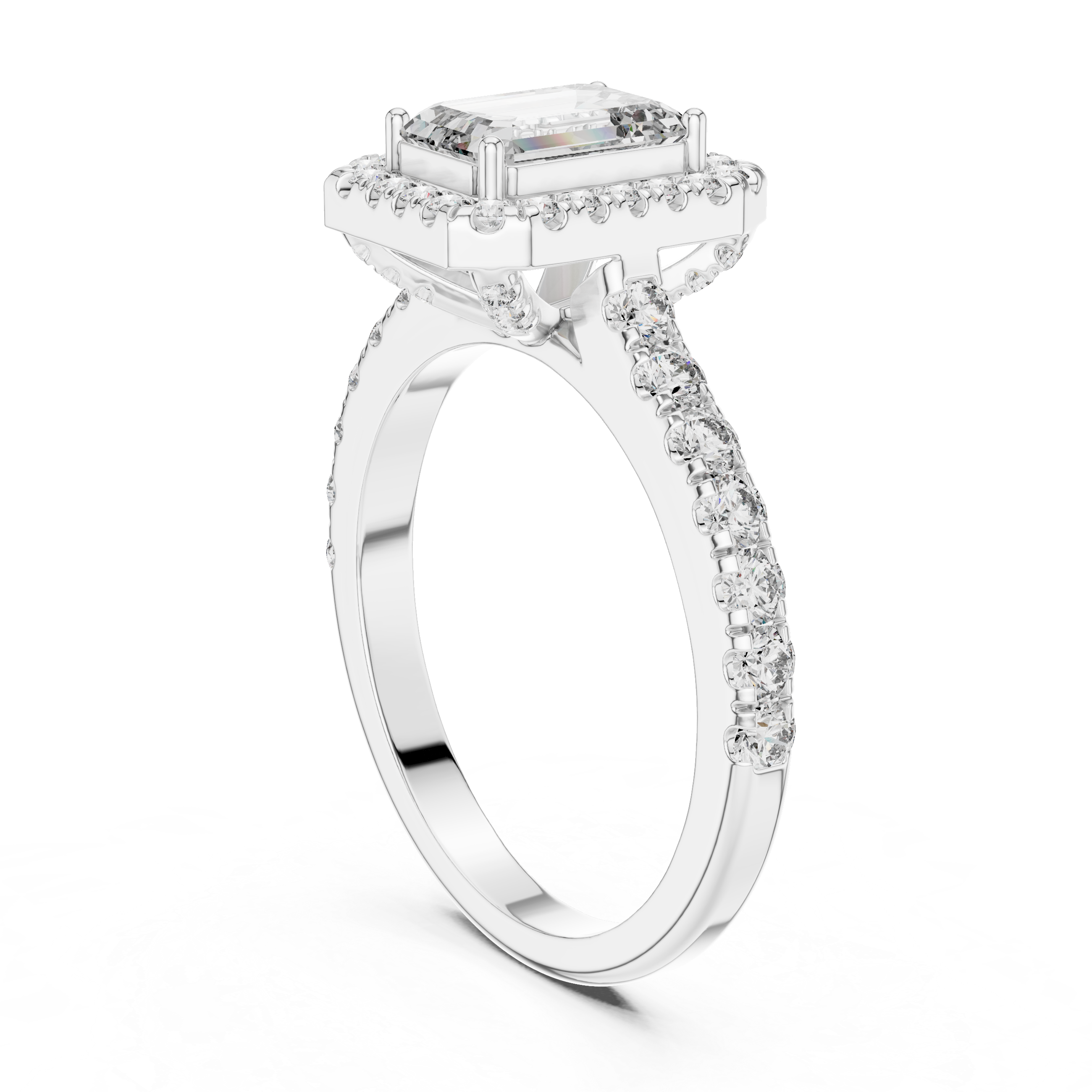 Diamond ring with a rectangular center stone on a white background