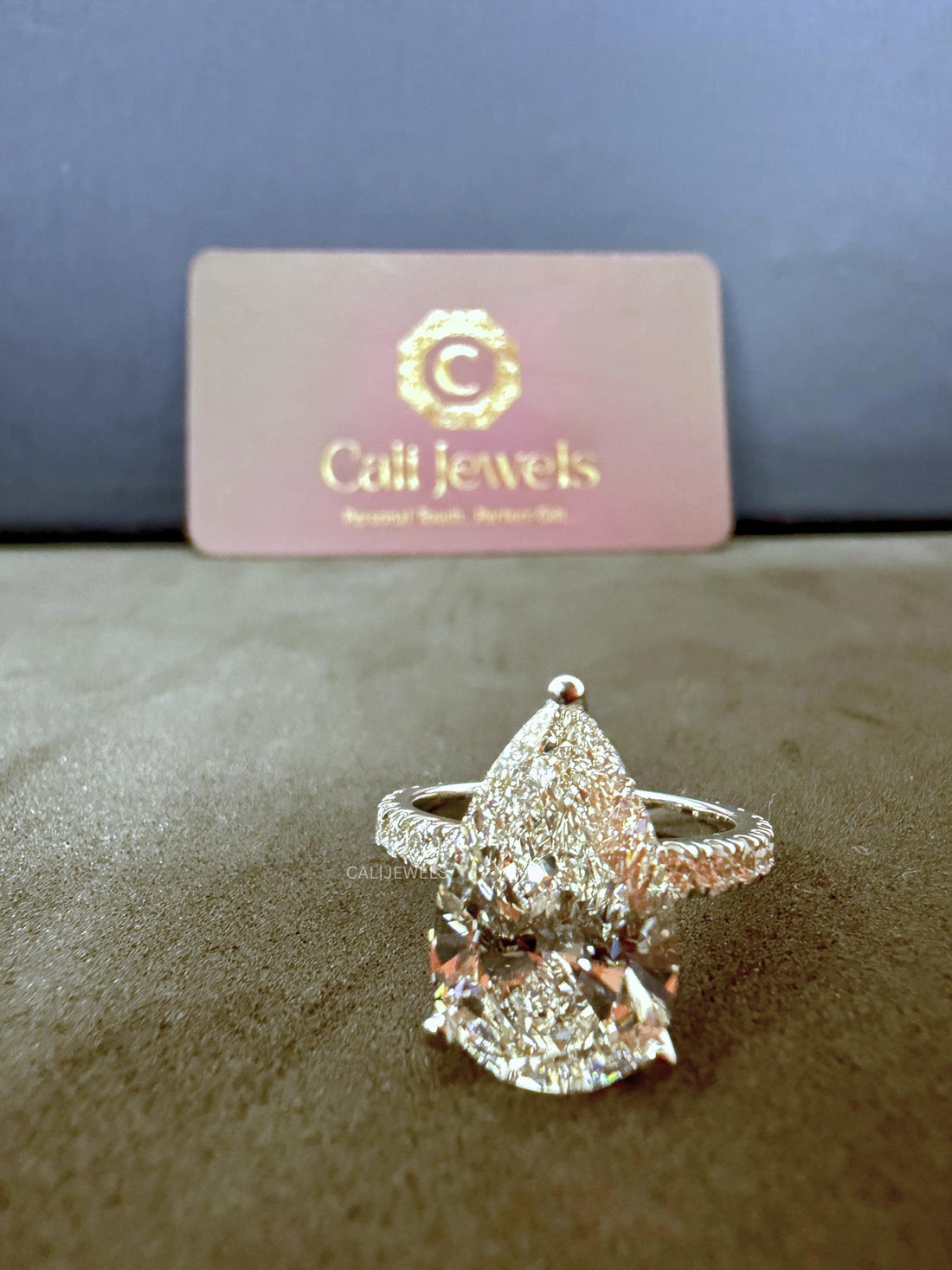 Pear Cut Lab Grown Diamond Engagement Ring with Pave Band