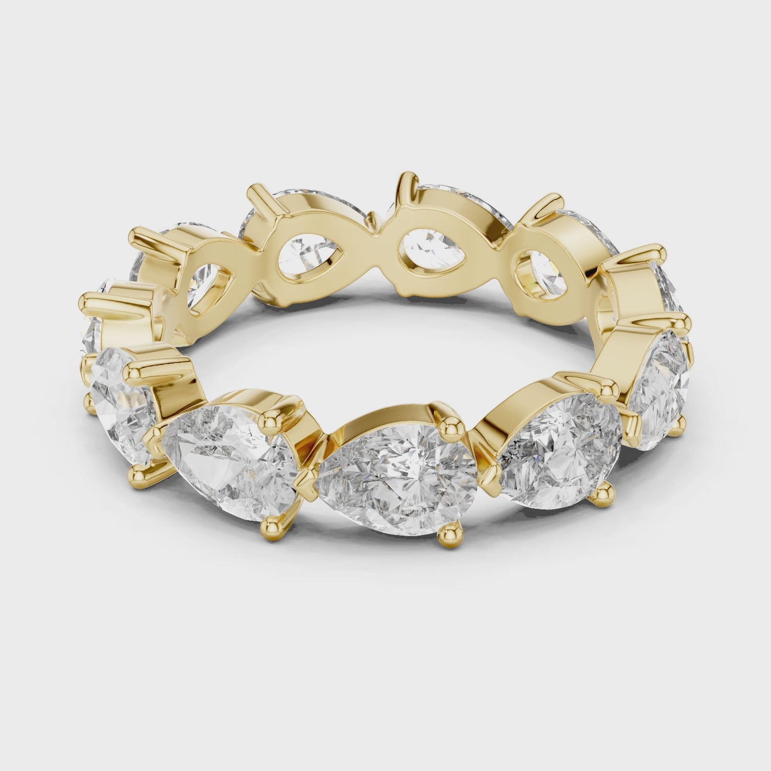 “Elegant Pear-Shaped Full Eternity Ring – White Gold”