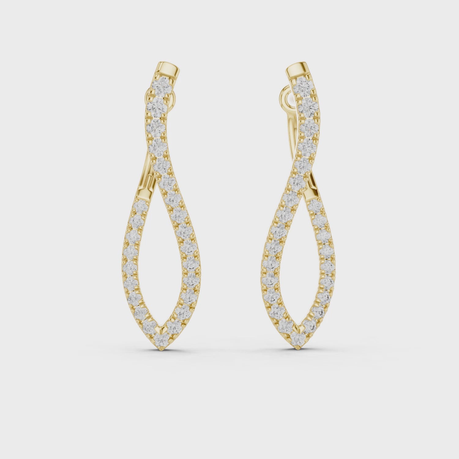 “Twist Hoop Diamond Earrings in 14Kt White Gold”