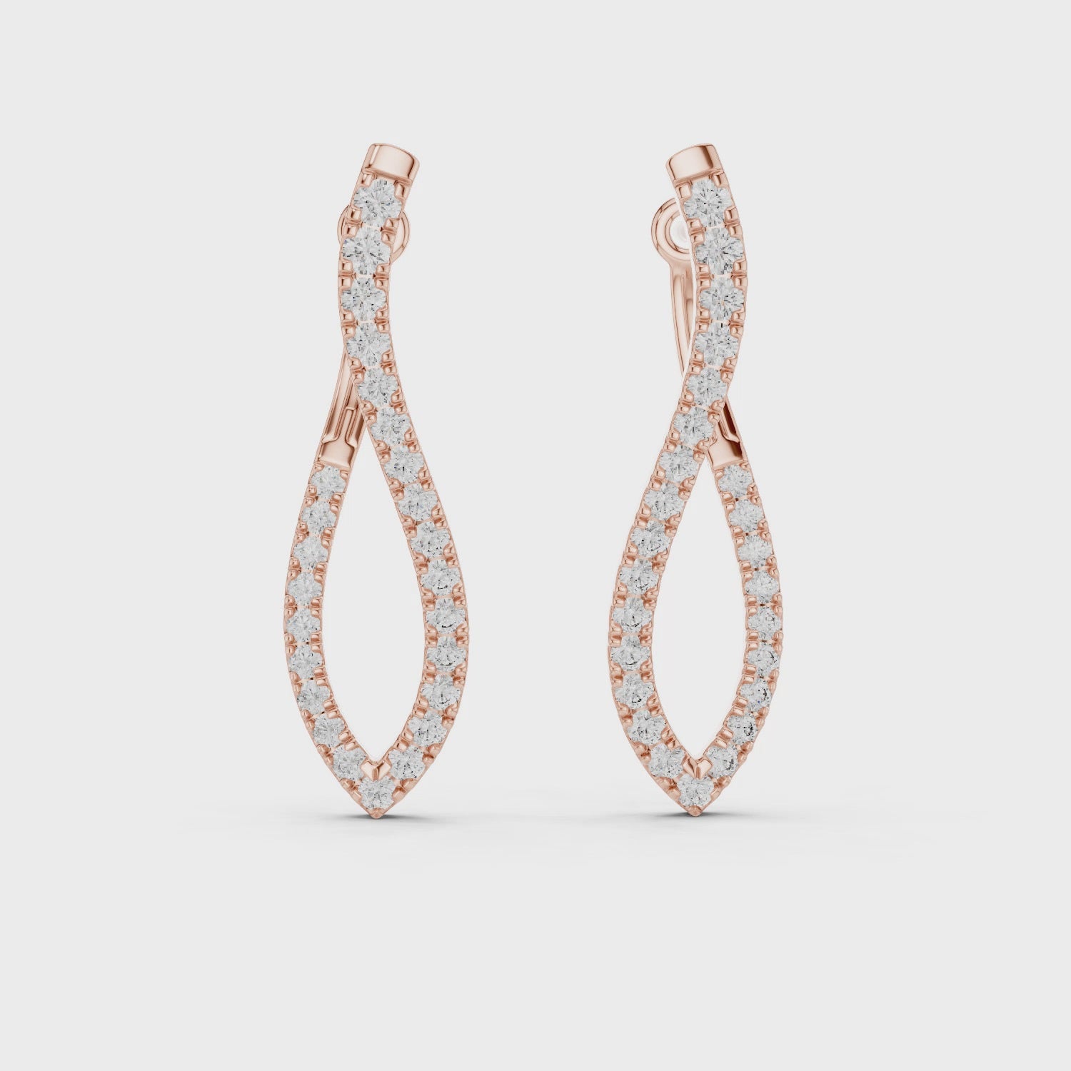 “Twist Hoop Diamond Earrings in 14Kt White Gold”